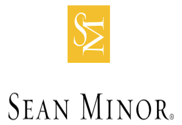 Logo with stylized letters 'SM' above the text 'EAN MINO'.